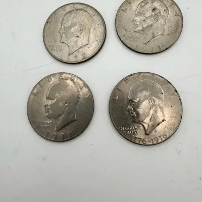 Four Liberty Silver Dollars Featuring Eisenhower Bicentennial, 