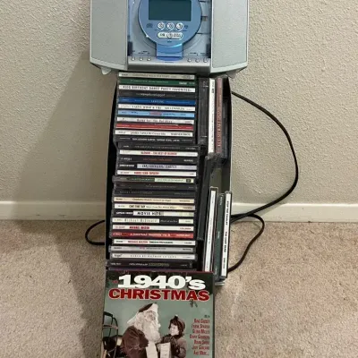 RCA Stereo CD Player & A Mixture Of CD's 