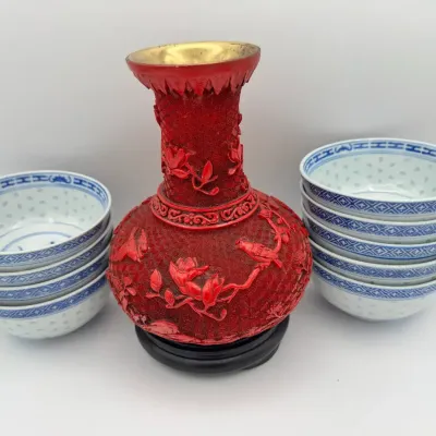 Large Cinnabar Vase With Chinese Porcelain Bowls