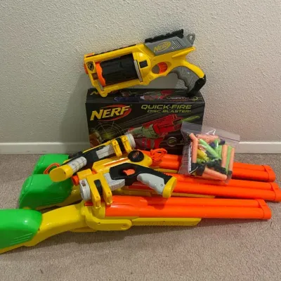 Nerf Quick-Fire Disc Blaster with Nerf Rifles & Guns + Extra Ammo 