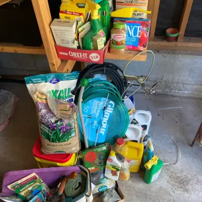 Gardener’s Lot Of Chemicals & Fertilizers With Soaker Hoses & Bag Full Of Garden Tools