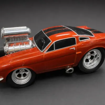 Red Die-Cast Muscle Car Toy With Exposed Engine