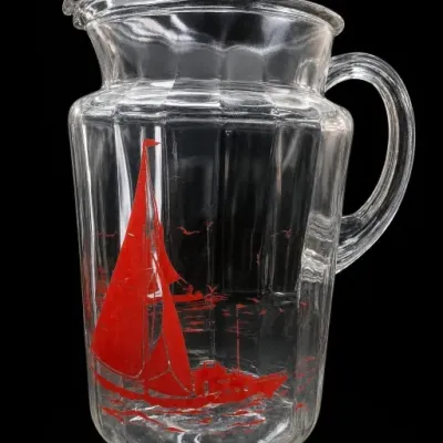 Clear Glass Pitcher With Red Sailboat Design