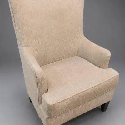 Beige Upholstered High-Back Armchair