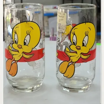 Sale Photo Thumbnail #63: Pair of Tweety Bird Glass Tumblers
