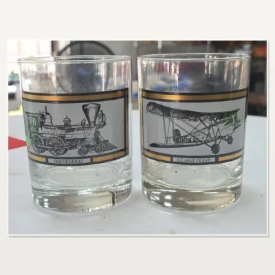 Sale Photo Thumbnail #109: Pair of Glass Tumblers With Train and Airplane Designs