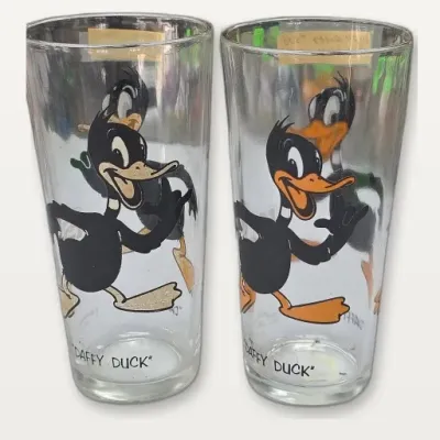 Sale Photo Thumbnail #167: Pair of Daffy Duck Glass Tumblers