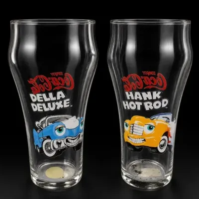 Sale Photo Thumbnail #193: Pair of Coca-Cola Della Deluxe and Hank Hot Rod Glasses