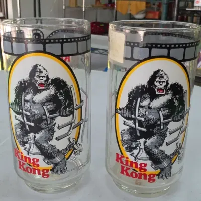 Sale Photo Thumbnail #173: Pair of King Kong Graphic Glass Tumblers