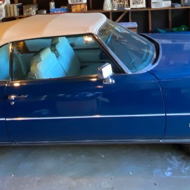 1972 Cadillac Eldorado convertible with white leather interior.