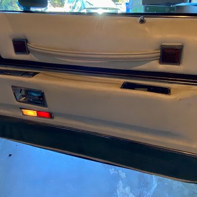 1972 Cadillac Eldorado convertible with white leather interior.
