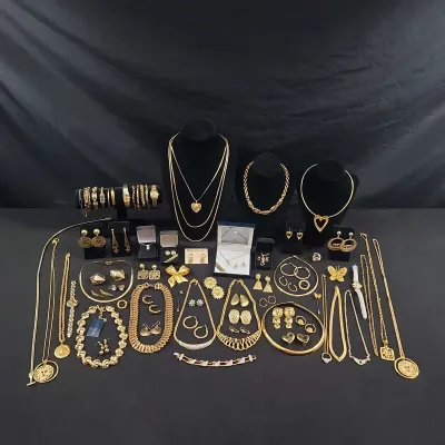 Gold Tone Jewelry Featuring Etienne Aigner 