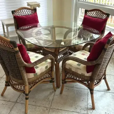 Round Glass-Top Rattan Dining Table with Four Armchairs