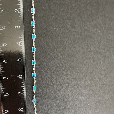 Sale Photo Thumbnail #87: Beautiful Silver Tone Bracelet with blue rhinestones 
Please see attached pictures 
((((((Please note that this bracelet is not 925)))))