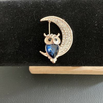 Sale Photo Thumbnail #208: Very nice rose gold toned moon and owl brooch with clear rhinestones 
Please see attached pictures