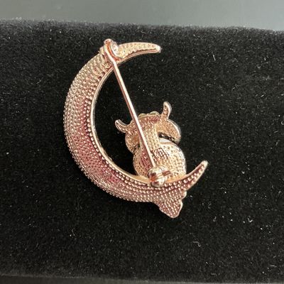 Sale Photo Thumbnail #210: Very nice rose gold toned moon and owl brooch with clear rhinestones 
Please see attached pictures