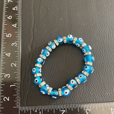 Sale Photo Thumbnail #177: Light blue Glass evil Eye stretchy bracelet 
Please see attached pictures