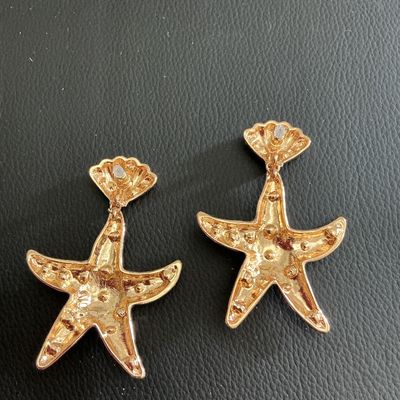 Sale Photo Thumbnail #222: Gold Tone starfish dangle fashion earrings 
Please see attached pictures