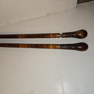 Sale Photo Thumbnail #467: Pair of Vintage Hand-Carved Wooden Walking Sticks with Floral Motifs