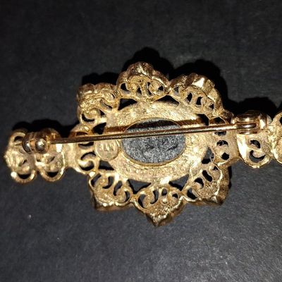 Sale Photo Thumbnail #846: Victorian Revival Sphinx Brooch with Black Glass and Pearl