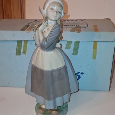 Sale Photo Thumbnail #301: Lladro 'Dutch Girl with Flowers' Figurine 1416