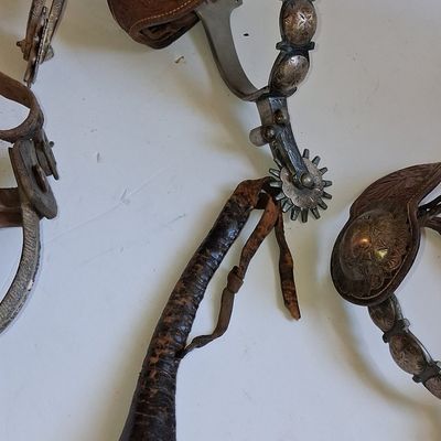 Collection of Vintage Western Spurs and Leather Quirt, including California Style