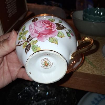 Sale Photo Thumbnail #684: Adderley Floral & Figurine Bone China Tea Cup and Saucer