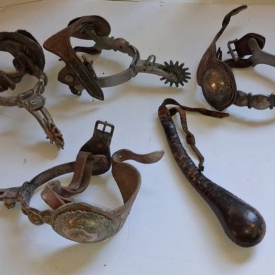 Sale Photo Thumbnail #63: Collection of Vintage Western Spurs and Leather Quirt, including California Style