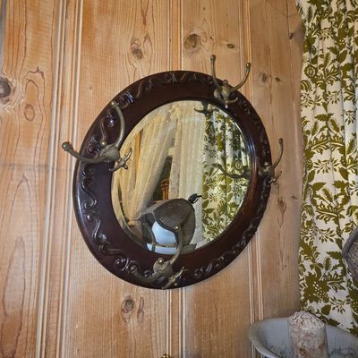 Sale Photo Thumbnail #470: Black Forest Style Oval Mirror with Coat Hooks
