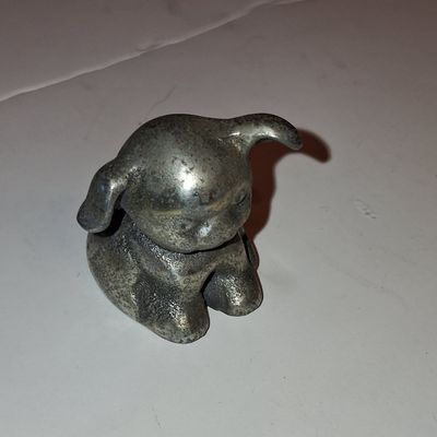 Sale Photo Thumbnail #784: Vintage Cast Iron Bucki Carbons Ribbons Dog Paperweight