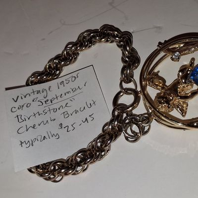 Sale Photo Thumbnail #845: Vintage Coro September Birthstone Cherub Charm Bracelet