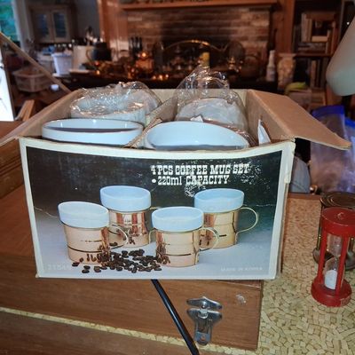 Sale Photo Thumbnail #790: Vintage Baker Hart & Stuart 4-Piece Copper and Ceramic Coffee Mug Set