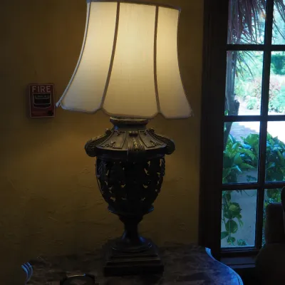 Sale Photo Thumbnail #43: Oversized decorative table lamp with substantial sculptural base, openwork detailing, and coordinating fabric shade. High-end traditional/Tuscan styling with strong visual presence, ideal for a large console, entry, or living space. 40" high Price is for 