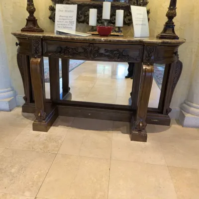 Sale Photo Thumbnail #53: Large ornate console or entry table featuring a stone or marble-style top, carved wood base, decorative drawer fronts, and substantial turned legs. Designed as a statement foyer piece and formerly used in an upscale clubhouse setting. 68"w*28"d*37"h