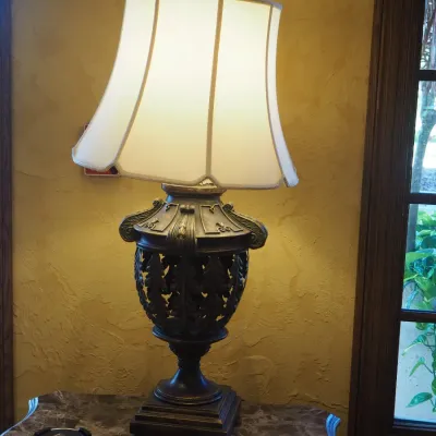 Sale Photo Thumbnail #45: Oversized decorative table lamp with substantial sculptural base, openwork detailing, and coordinating fabric shade. High-end traditional/Tuscan styling with strong visual presence, ideal for a large console, entry, or living space. 40" high Price is for 