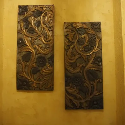 Sale Photo Thumbnail #168: Coordinating pair of tall decorative wall panels featuring raised floral, leaf and scrollwork designs in layered bronze, brown and antiqued gold tones. Each panel measures approximately 15" wide x 35" high and has a substantial dimensional relief that wor