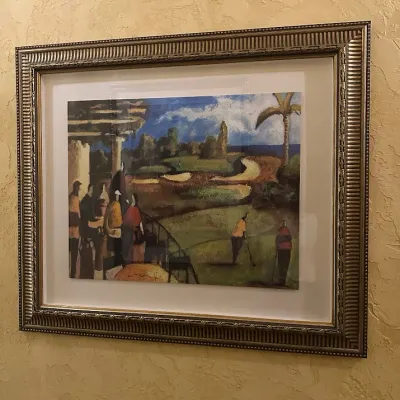 Sale Photo Thumbnail #79: Colorful contemporary golf scene depicting golfers overlooking a lush course with water and palm trees. Loose painterly styling with warm earth tones and greens, professionally matted in a substantial decorative frame.