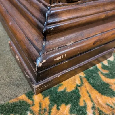 Sale Photo Thumbnail #41: Large traditional-style wood cabinet featuring deeply carved doors, decorative trim, upper drawers, and substantial molding throughout. Rich warm finish with an impressive architectural look. Ideal as a bar cabinet, storage cabinet, entry piece, or statem