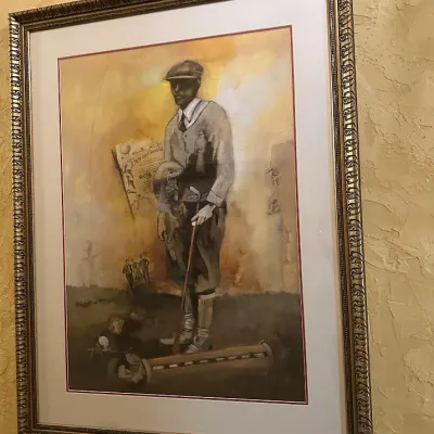 Sale Photo Thumbnail #74: You are bidding on a set of 4 items. Large framed golf artwork depicting a traditionally dressed early-era golfer with clubs and period-inspired graphic elements. Warm sepia and golden tones, professionally matted, and presented in an ornate antiqued fram