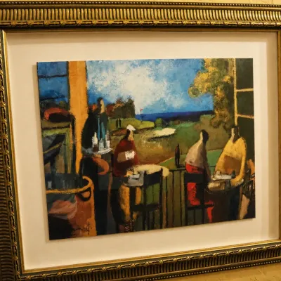 Sale Photo Thumbnail #82: Framed contemporary golf-themed artwork depicting figures overlooking a course from a clubhouse or terrace setting. Rich colors and abstract painterly styling, professionally presented in an ornate coordinating frame. 42*36