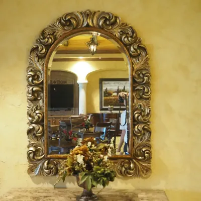 Sale Photo Thumbnail #115: Impressive oversized arched mirror surrounded by deeply sculpted acanthus and scroll detailing in an antiqued bronze/gold finish. A substantial statement mirror ideal for a foyer, powder room, dining room, or large entry wall.