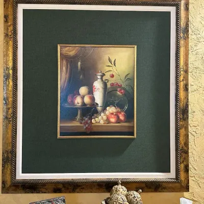 Sale Photo Thumbnail #67: Traditional still life depicting fruit, grapes, and decorative vessels, dramatically presented with an oversized deep-green surround and antiqued decorative frame. 60.5*70.5