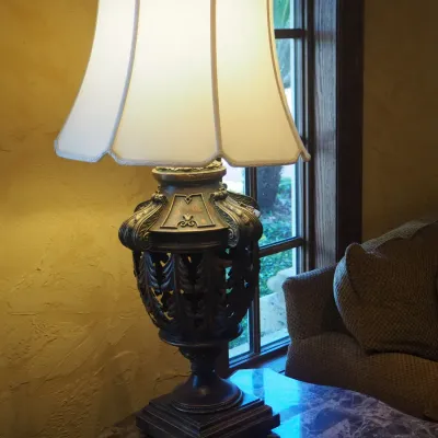 Sale Photo Thumbnail #44: Oversized decorative table lamp with substantial sculptural base, openwork detailing, and coordinating fabric shade. High-end traditional/Tuscan styling with strong visual presence, ideal for a large console, entry, or living space. 40" high Price is for 