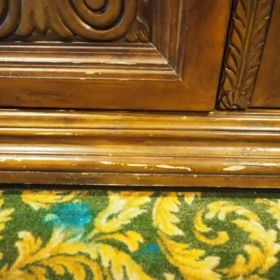 Sale Photo Thumbnail #28: Large traditional buffet or sideboard featuring a bowed center, multiple drawers, carved door panels, decorative hardware, and a warm wood finish. Substantial storage and strong architectural presence. 21deepx 70 wide by 37h

Two of these, only one has th