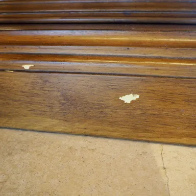 Sale Photo Thumbnail #49: Large ornate console or entry table featuring a stone or marble-style top, carved wood base, decorative drawer fronts, and substantial turned legs. Designed as a statement foyer piece and formerly used in an upscale clubhouse setting. 68"w*28"d*37"h