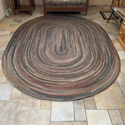 Oval braided area rug