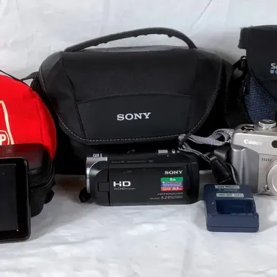 Sony Digital HD Video Camera/ Canon Power Shot G2, Garmin GPS Navigation 