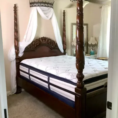 Ornate 4-Poster Bed and Beautyrest Mattress 