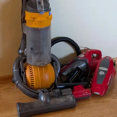 Dyson DC25 All Floors Upright Vacuum & Dirt Devil Handheld Vacuum Bundle - 3 Pcs