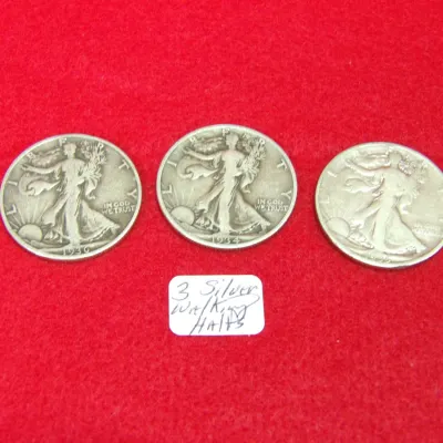Sale Photo Thumbnail #230: 3 silver walking halves